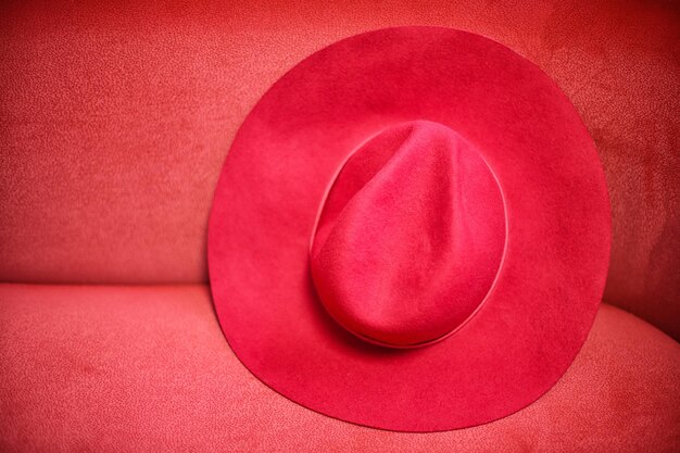 Elegance lady red hat on the red background