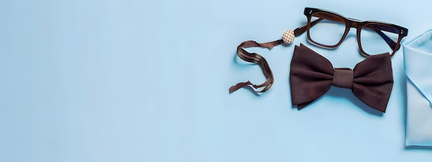 Elegance in Study Bow Tie and Glasses atop a Book