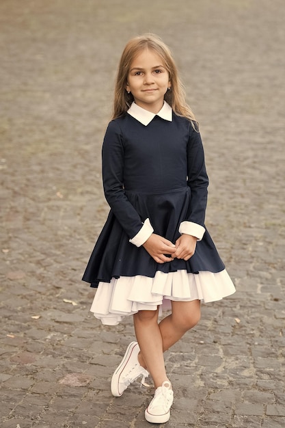 Elegance that you deserve little child wear uniform dress\
outdoors back to school fashion fashion look of small girl school\
dress code september 1 formal education fashion trends for\
fall