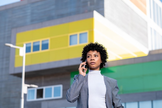 An elegant African American woman working in an office building