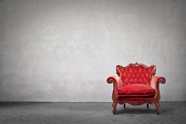 elegant armchair on grey background