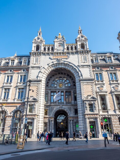 Elegant beautiful design at front of Antwerp train station in Belgium under blue sky