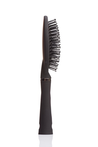 Elegant black hair comb brush with handle isolated white background