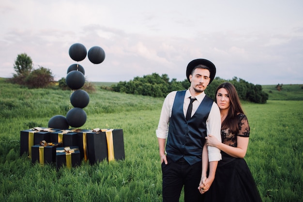 Elegant bride and groom posing together outdoors on a wedding day