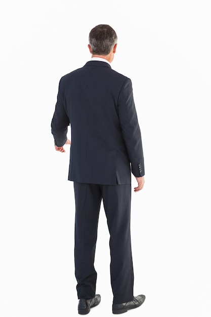 Elegant businessman standing and gesturing