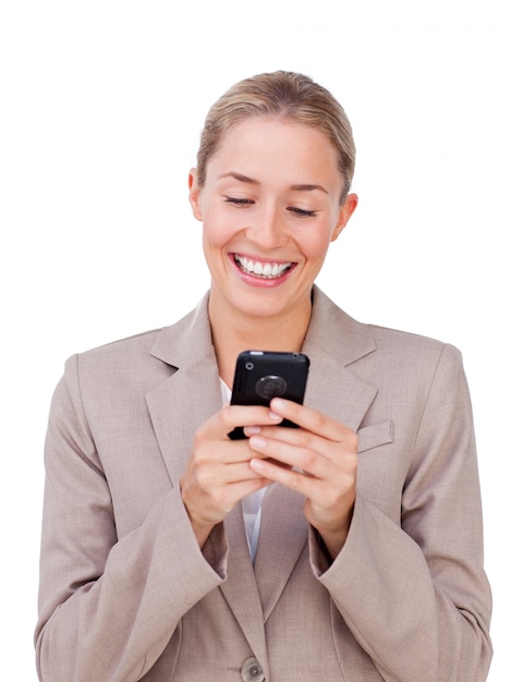 Elegant businesswoman sending a text 