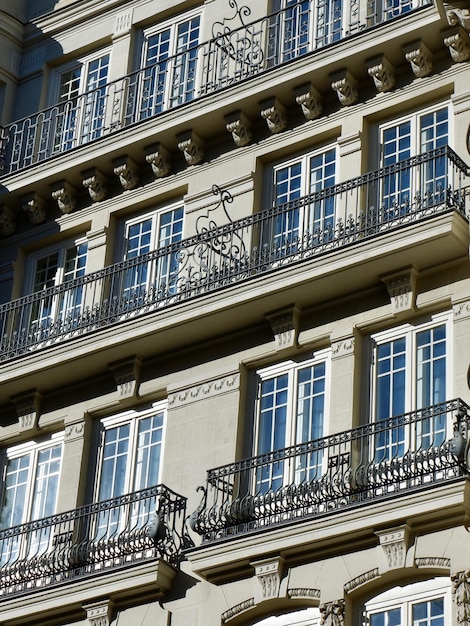 Elegant classy building with windows and balconies in Madrid