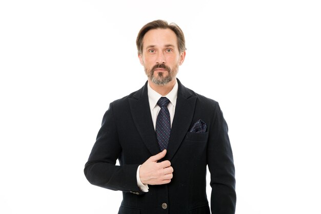 Elegant and confident Fashionable aged business person Mature businessman in formal wear Senior man with grey beard hair Bearded mature man in business style Back to work in a suit and tie