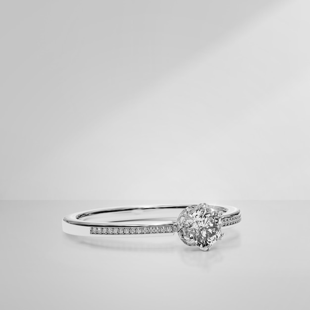 Элегантное бриллиантовое кольцо на светлом фоне с тенями