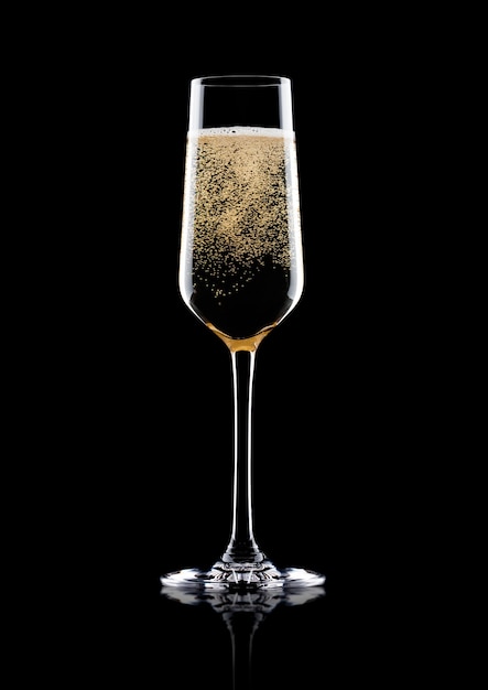 Elegant glass of yellow champagne with bubbles