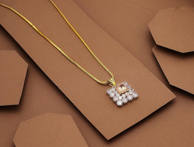 Elegant gold necklace with diamonds necklace gold big luxury on a background paper
