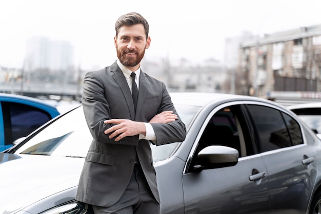 Elegant male taxi driver in costume