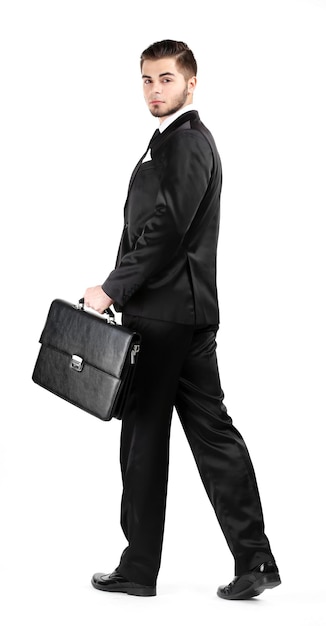 Elegant man in suit with briefcase isolated on white