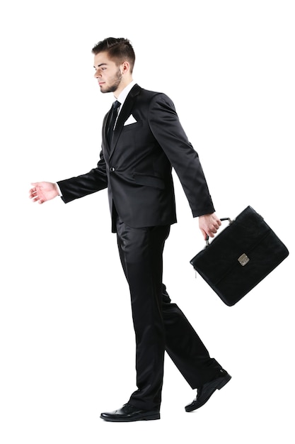 Elegant man in suit with briefcase isolated on white