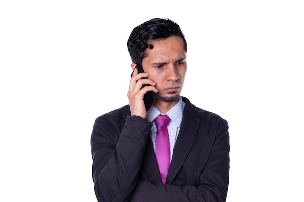 Elegant man talking on the phone with serious expression isolated on white background