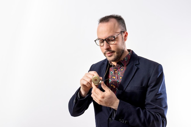 Elegant man with a golden pocket watch