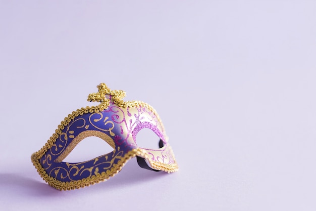 Elegant mask on lilac