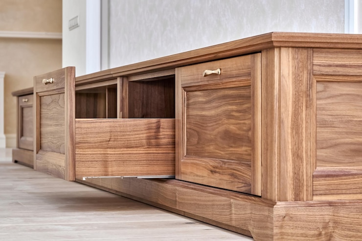 Photo elegant new tv cabinet made of veneer and solid walnut lumber with open drawer low angle view