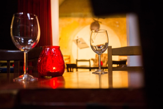 Elegant restaurant table with cutlery, crockery and glasses.