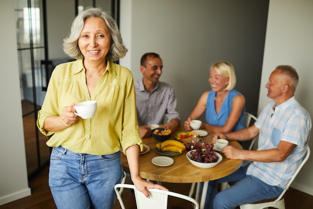 Elegant Senior Woman Posing with Friends