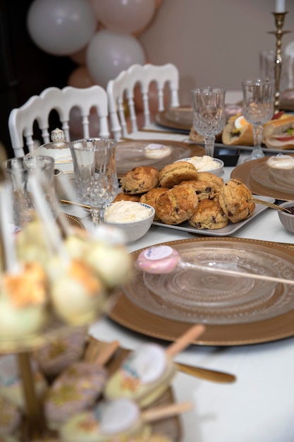 Elegant sweet table with sweets and decoration baby shower party