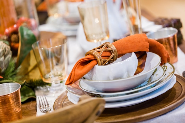 Elegant table prepared for Thanksgiving dinner with family and friends.