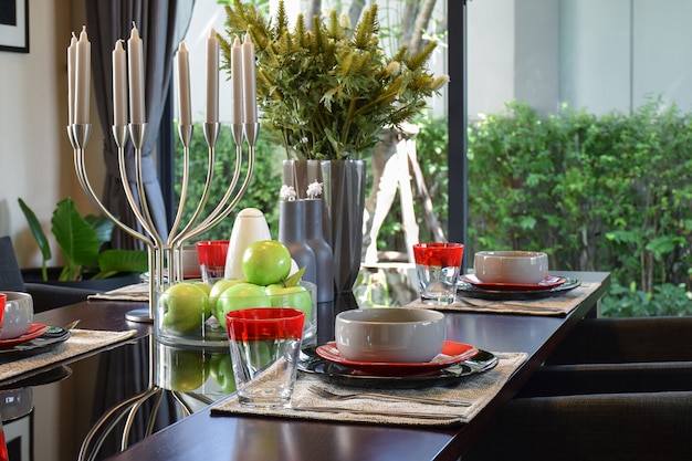 Elegant table set in modern style dining room interior