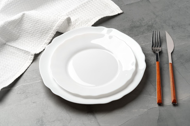 elegant table setting on grey marble background