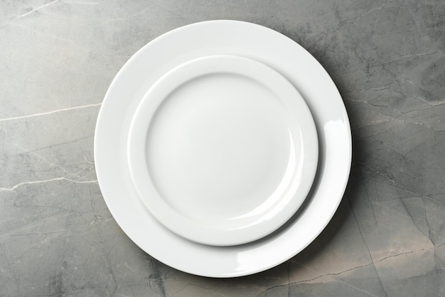 elegant table setting on grey marble background