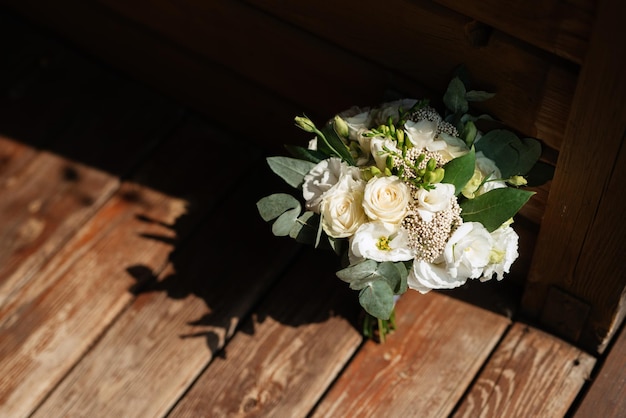 Elegant wedding bouquet of fresh natural flowers and greenery