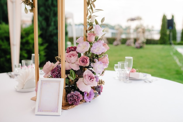 Elegant wedding decorations made of natural flowers and green elements