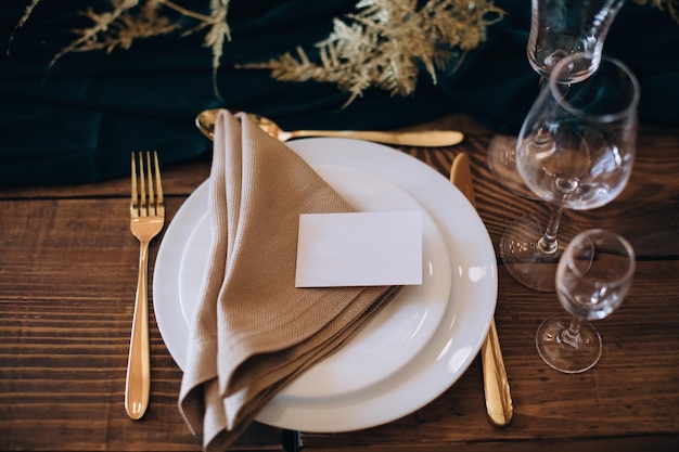 Elegant wedding table set for dinner on wooden tablexA