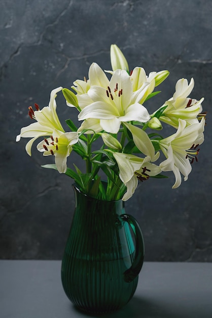 elegant white lillies in a green jub