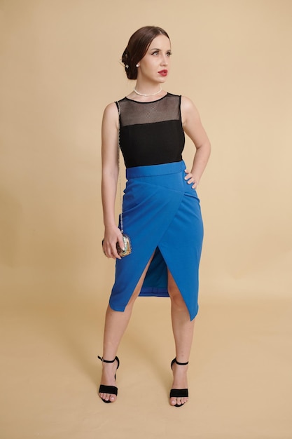 Elegant Woman in Blue Pencil Skirt