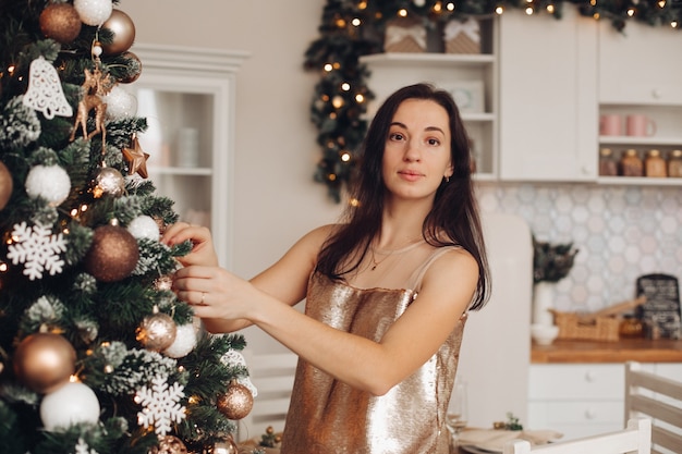 Elegant woman celebrating Christmas at home