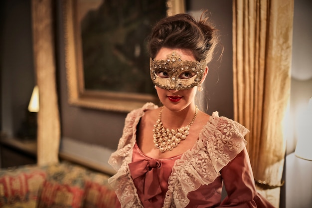 Elegant woman in mask