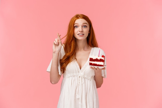 Elegant woman with a piece of cake