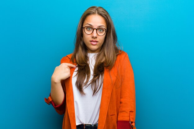 elegant young girl feeling surprised and innocent