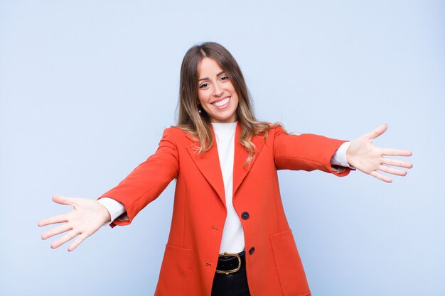 elegant young woman giving a warm friendly hug