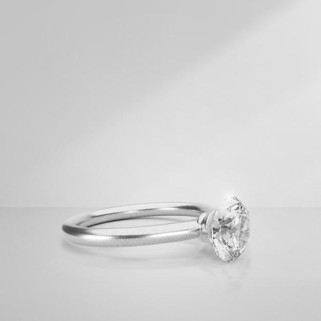 Elegante diamanten ring op lichte achtergrond met schaduwen