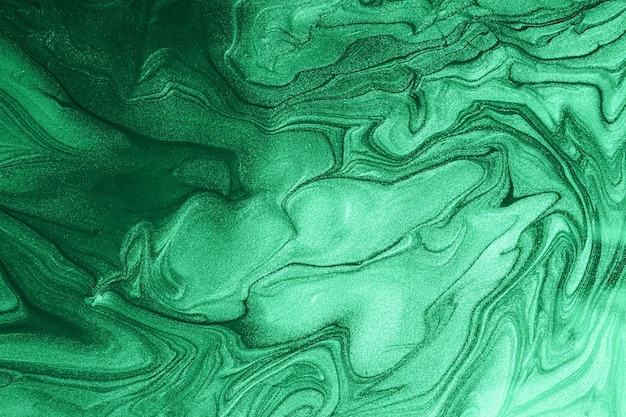 Elegante marmeren smaragdgroene monochrome achtergrondmake van vloeibare nagellakkenGoed als cosmetica-achtergrond