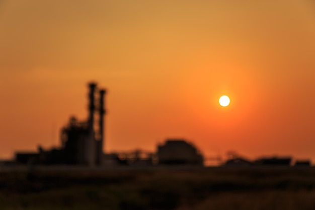 Elektrische installatie en avondrood Achtergrond vervagen