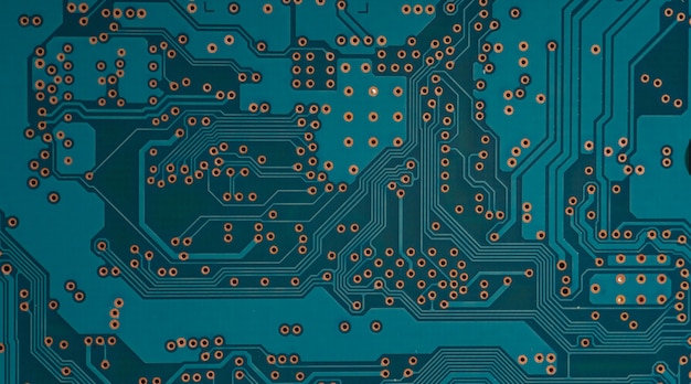 Elektronische printplaat close-up. blauwe PCB circuit achtergrond