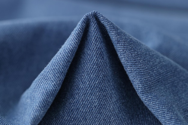 Element of blue denim fabric jeans textile close up