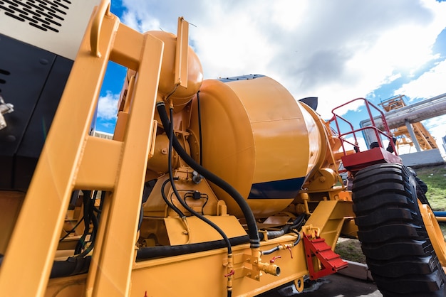 Photo element of the yellow concrete mixer