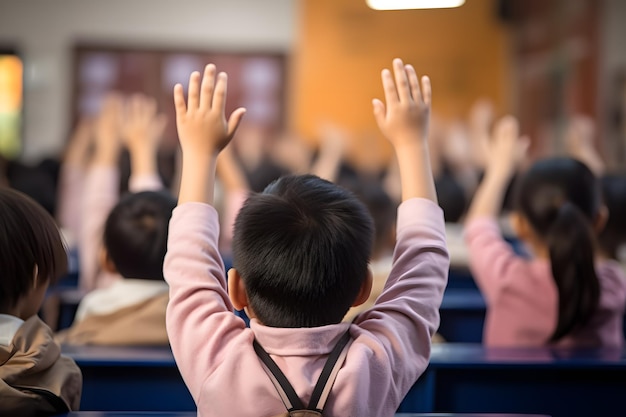 Elementary school kids raising hands in classroom academic engagement