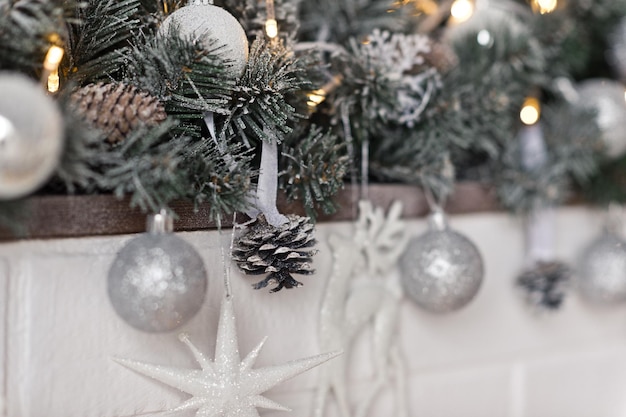 Elements of Christmas decorations and toys on the mantelpiece 9324