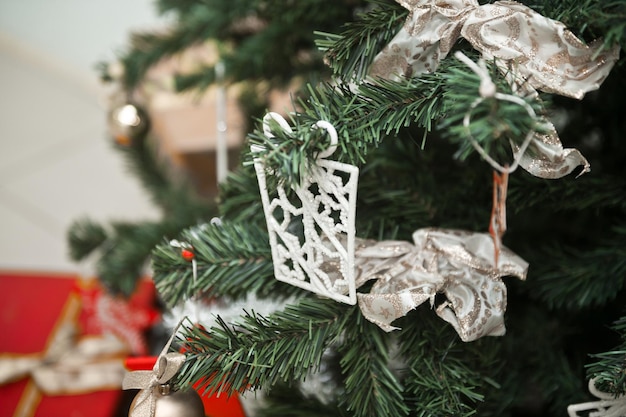 Elements of a Christmas tree with decorations in closeup 3755