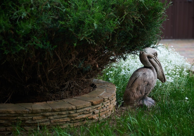 Elements of decor and decoration of the garden in an unrecognizable private estate Landscaping