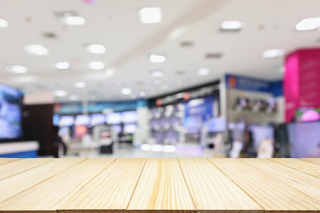 Photo eletronic department store show television tv and home appliance with bokeh light blurred background